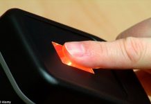 Airline tests system that identifies passengers using a thumb scan