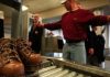 Flyers made to remove shoes, belts at airports