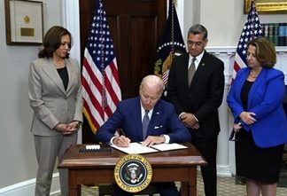 Biden signs bill mandating revamp of outdated prison surveillance systems