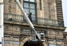 Louvre museum installs security bars on balcony used in October’s heist