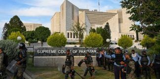 Pakistan’s defense minister backs surveillance by spy agency, challenged in court