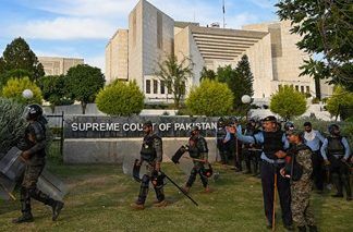 Pakistan’s defense minister backs surveillance by spy agency, challenged in court