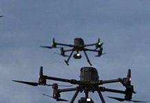 Russia lets private firms buy heavy weapons to defend sites from drone attacks