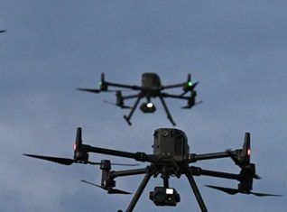 Russia lets private firms buy heavy weapons to defend sites from drone attacks